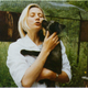 The foxes bred for tameness sought out human affection and even licked the faces of their handlers, in this case Marina Nurgalieva from the Russian Academy of Sciences.